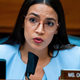 Rep. Alexandria Ocasio-Cortez questions Postmaster General Louis DeJoy during a House Oversight hearing.